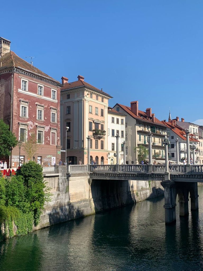cityscape in a European city with houses on the banks of a canal